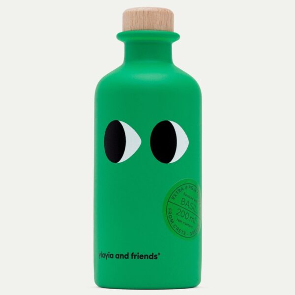 Vibrant green bottle of basil infused extra virgin olive oil 200ml with wooden stopper.