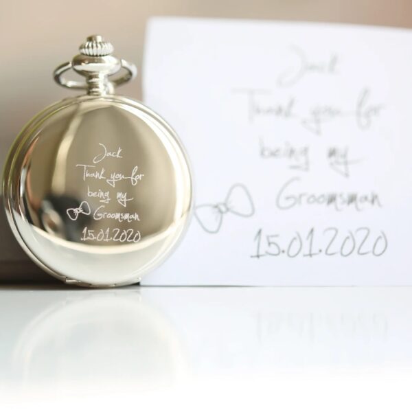 Polished silver-tone pocket watch engraved in handwriting with Jack Thank you for being my Groomsman 15.01.2020 and a bow tie drawing, beside the original handwritten note