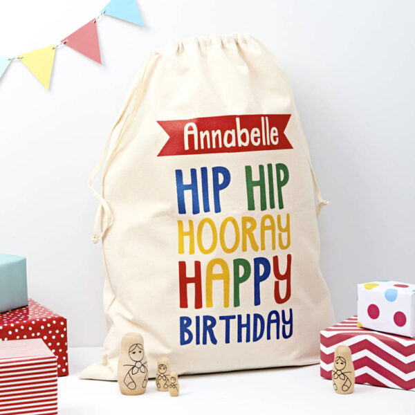 Personalised child's birthday present sack printed with Annabelle Hip Hip Hooray Happy Birthday surrounded by wrapped gifts