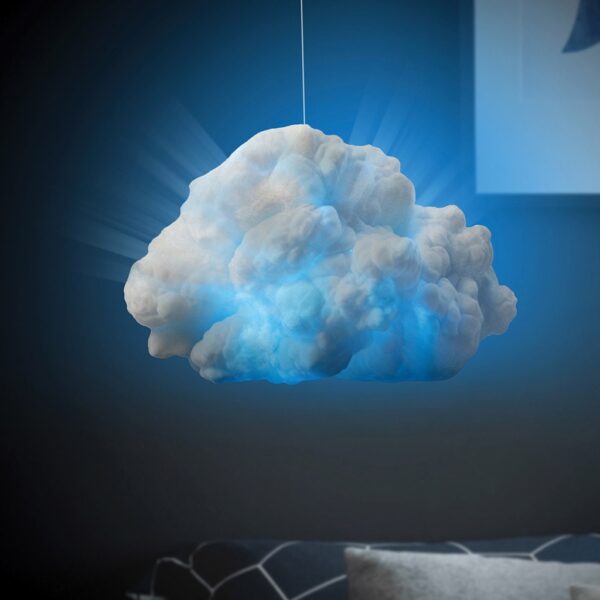 DIY cloud light glowing blue hanging above a bed